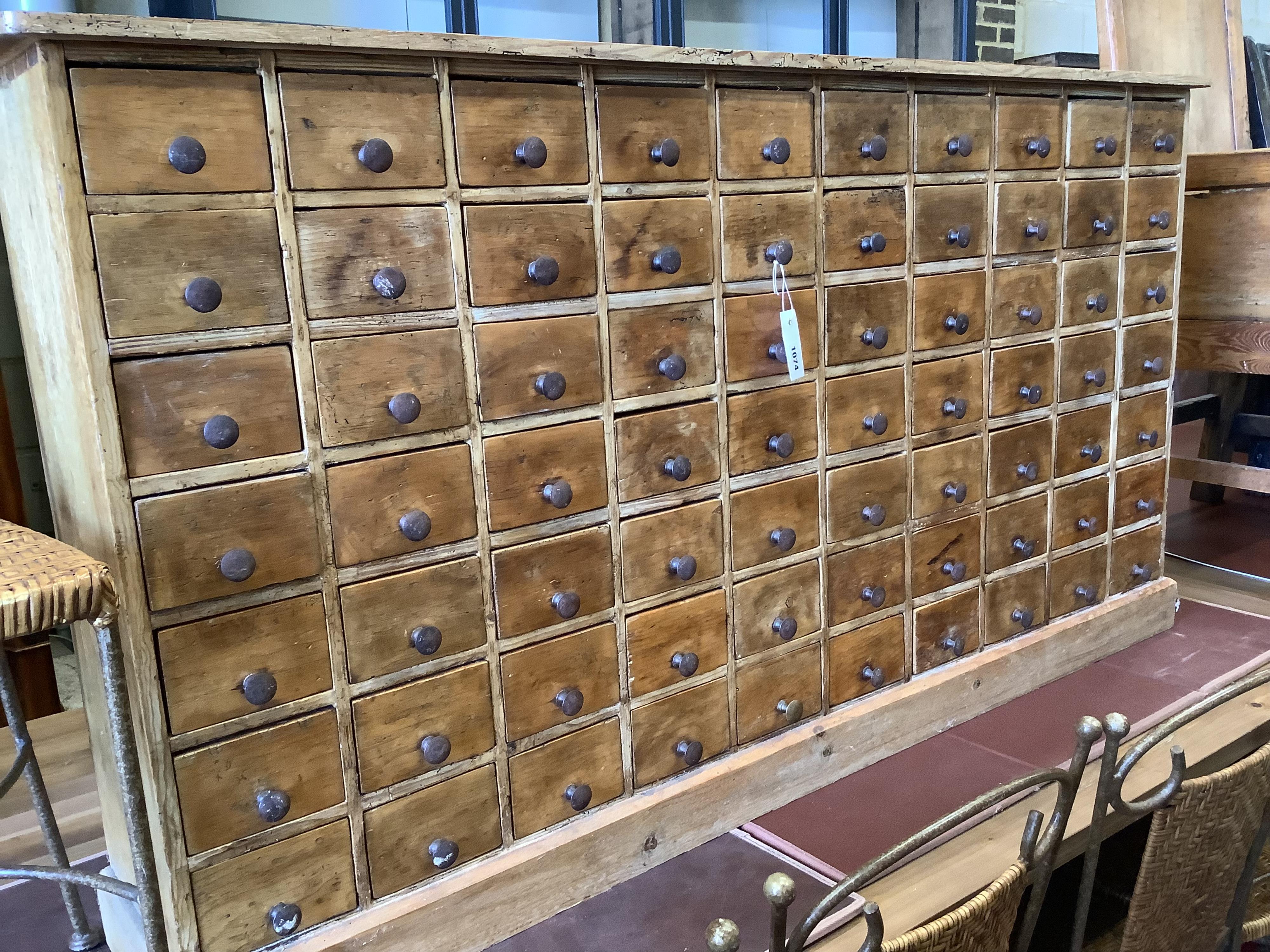 A Victorian apothecaries bank of 70 small drawers